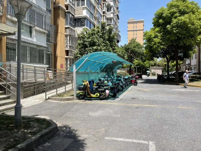 宝山这个小区为电瓶车充电出“妙招”