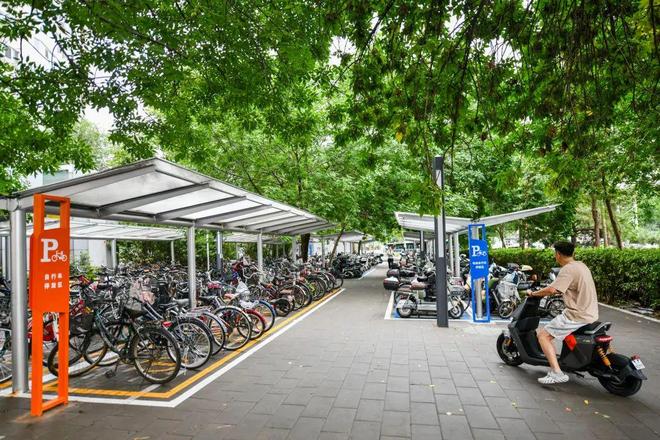 J9九游会：治理电动自行车乱象丰台推行地铁站口不同车辆分区停放(图4)